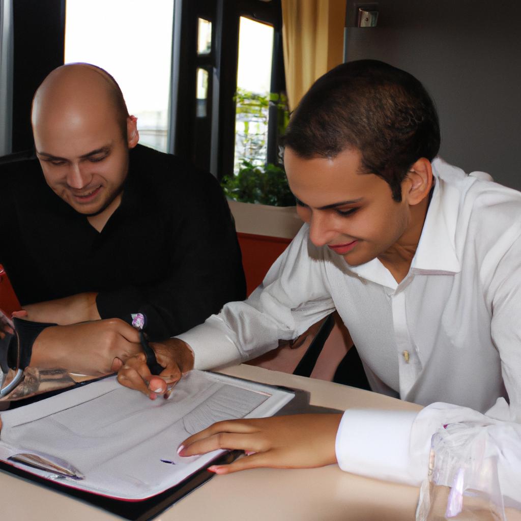 Investor signing restaurant financing documents