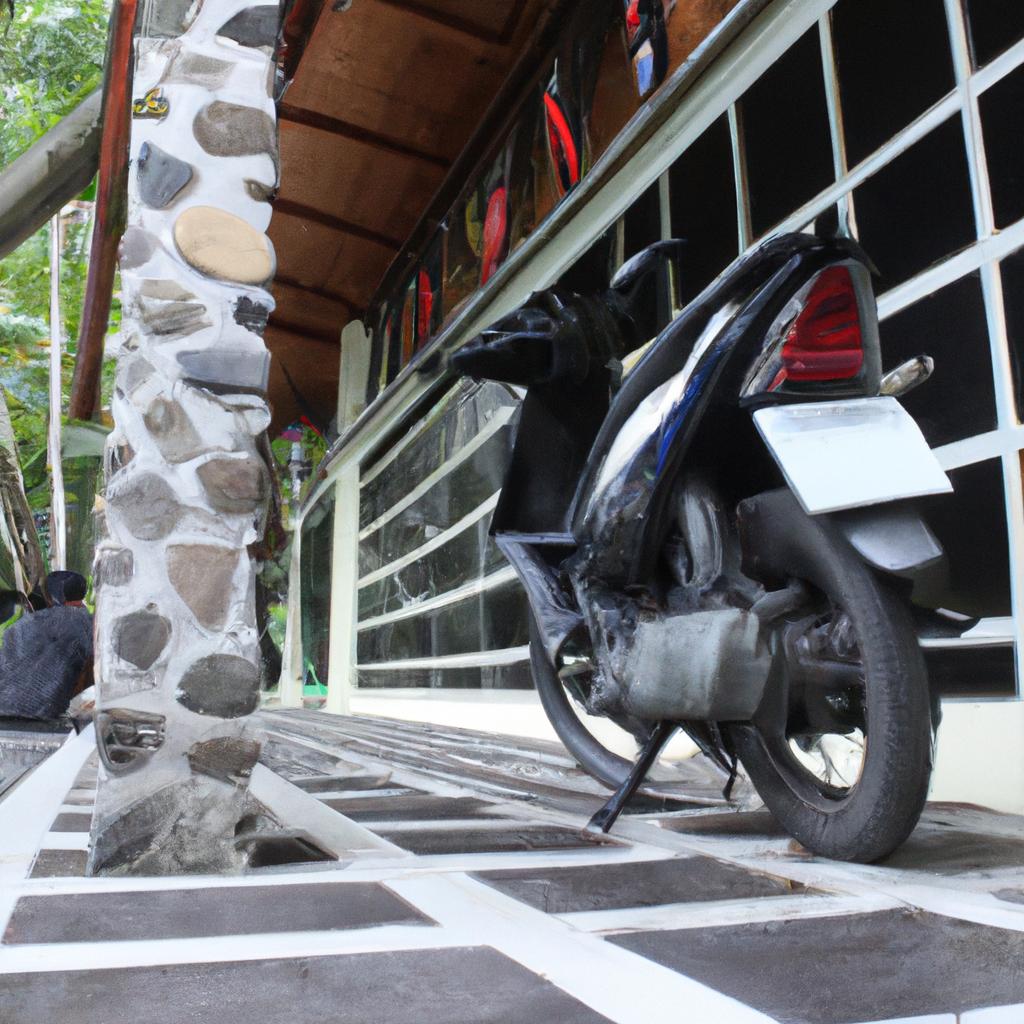 Person parking motorcycle at restaurant